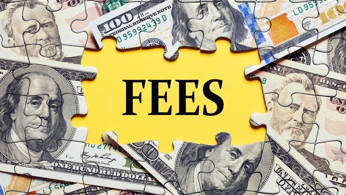 an illustration of the word FEES within the missing pieces of a jigsaw puzzle composed of $50 and $100 bills