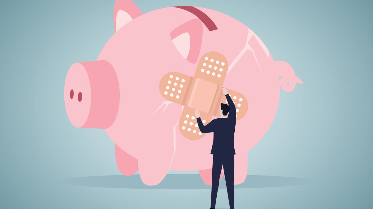 an illustration of a man in a suit patching up a broken piggy bank with adhesive bandages