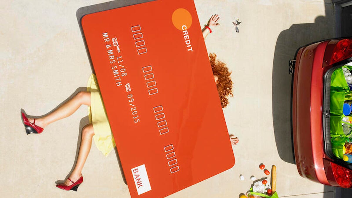 Woman flattened by giant credit card