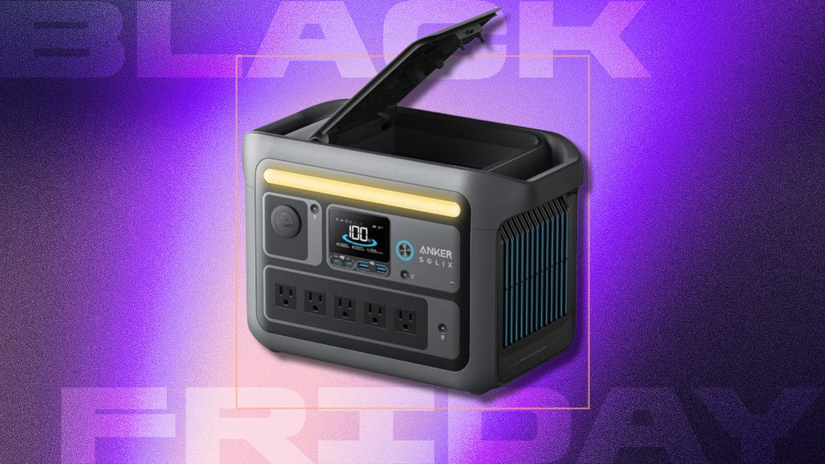 A gray portable power station against a yellow CNET background.