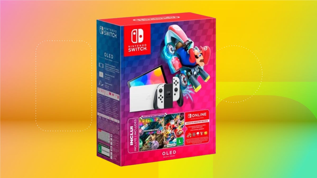 Nintendo Switch OLED Mario Kart 8 Deluxe bundle on red CNET background