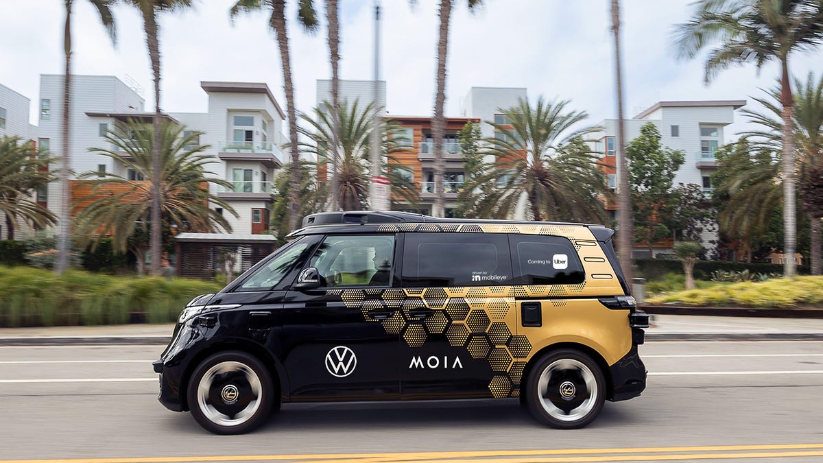 An MOIA/Uber testing vehicle drives on a street in Los Angeles