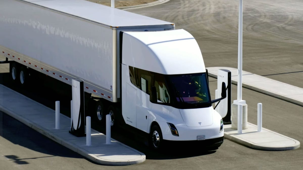 A Tesla Semi parked at a charging station