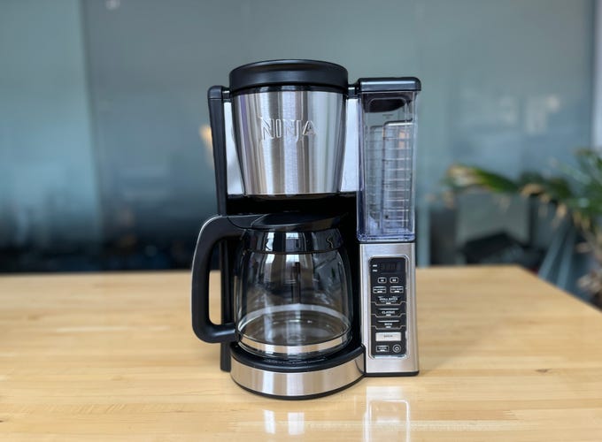 Ninja Coffee Maker on a brown table