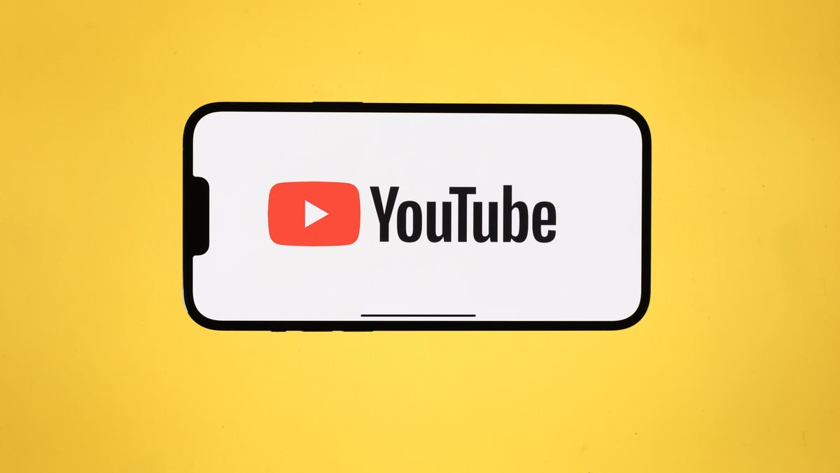 YouTube logo on a phone screen