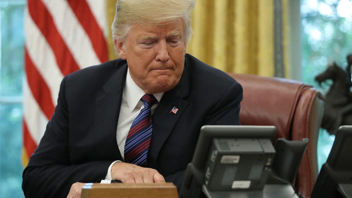 President Trump at his desk in the Oval Office