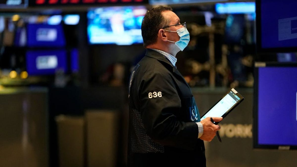 A trader on the floor of the New York Stock Exchange