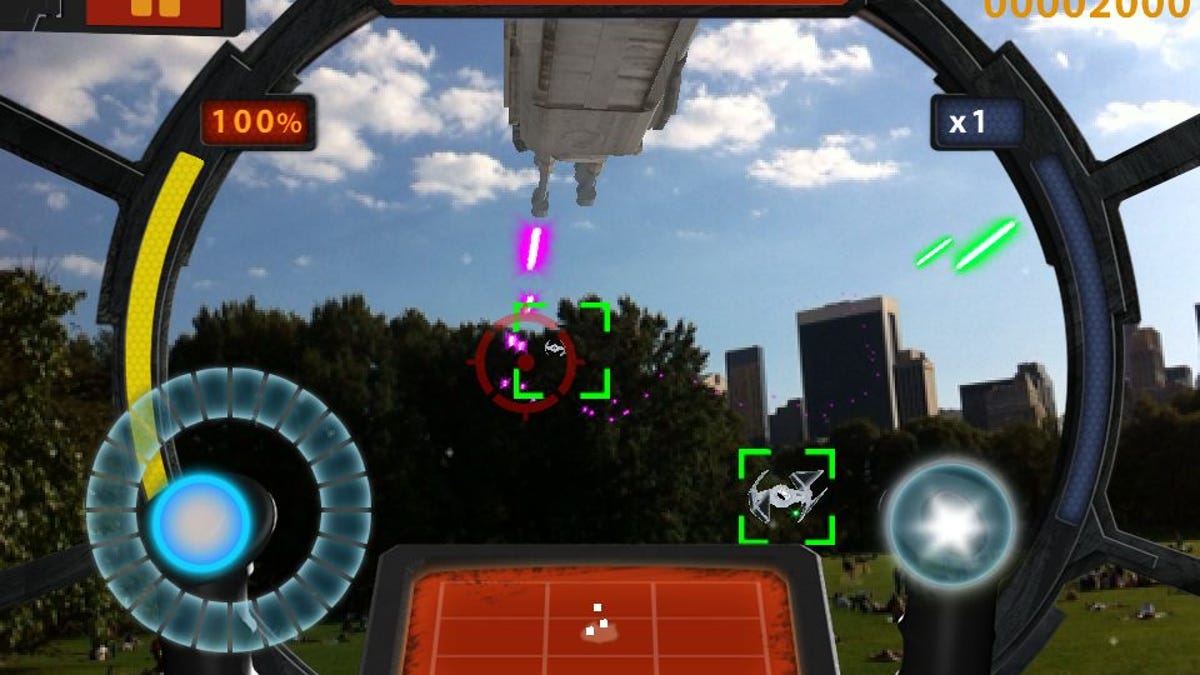 The forest is strong in this one. Wait, forest? In Star Wars Arcade: Falcon Gunner, the background is wherever you point your iPhone or iPod camera.