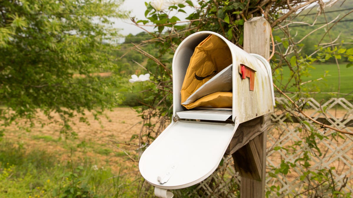 mail-packages-usps-fedex-amazon-ups-doorstep-mailbox-letters-shipping-coronavirus-stay-at-home-2020-cnet