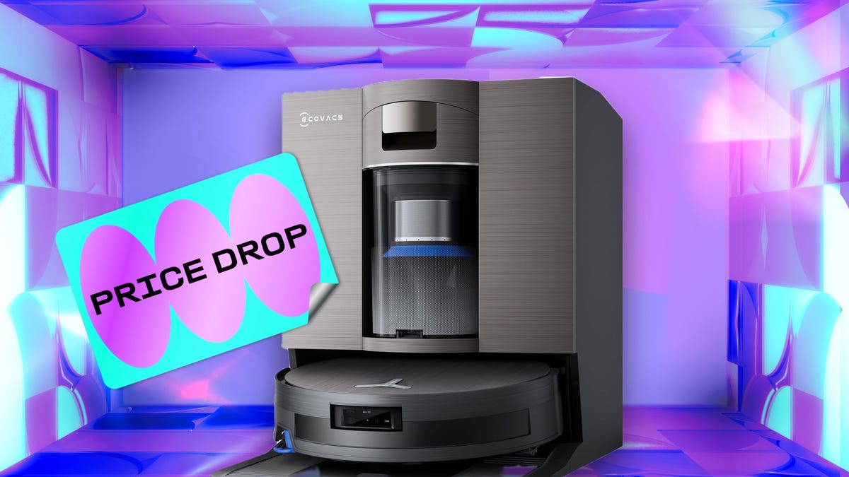 An Ecovacs robot vacuum on a CNET background.