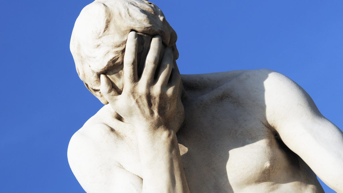 statue facepalming