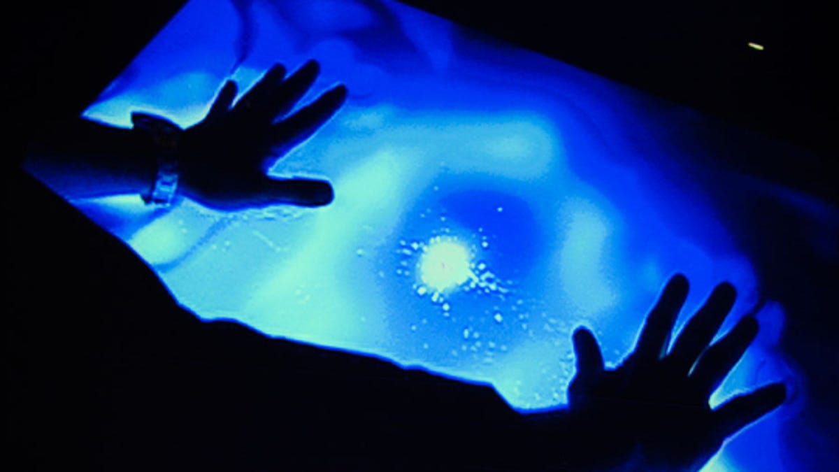 Microsoft demos Surface 2.0 at a press briefing at CES 2011.