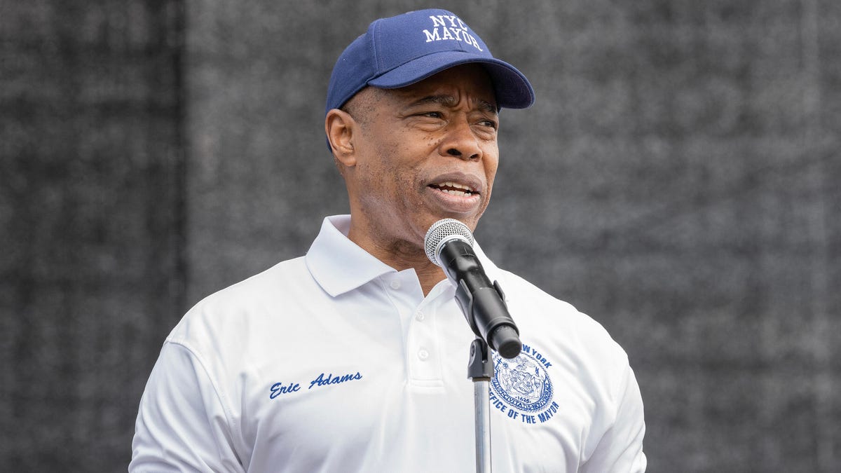 New York City Mayor Eric Adams at a microphone