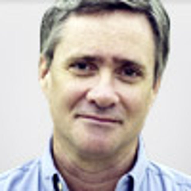 Headshot of William Harwood