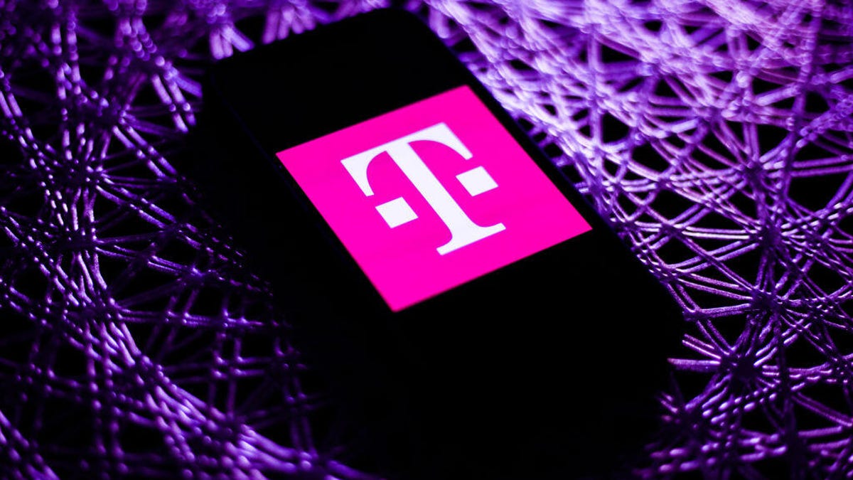 T-Mobile logo is seen displayed on a phone screen