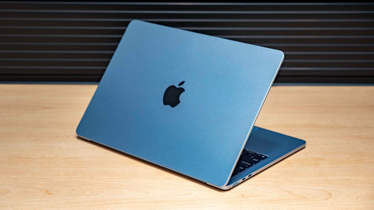 Apple MacBook Air M4 in Sky Blue color.