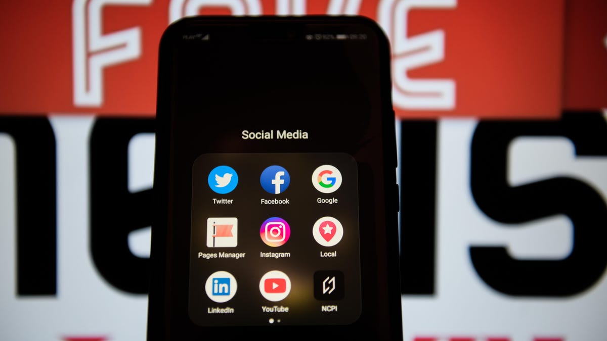 Social media logos are seen on an Android mobile phone