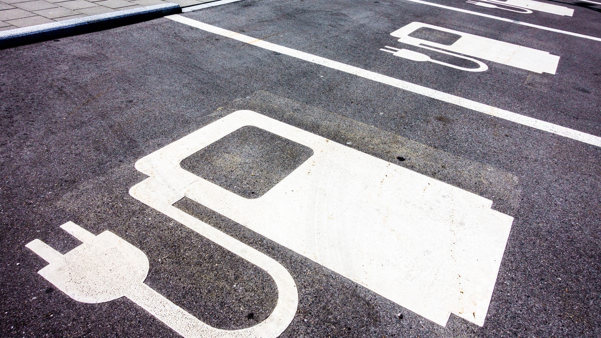 parking spot with sign for charging station on it