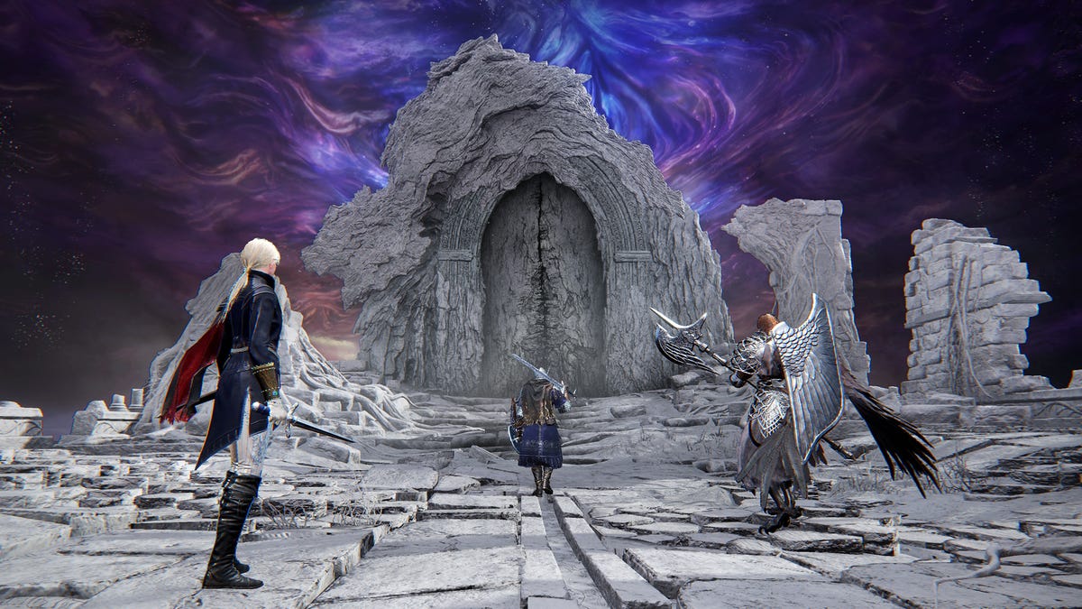 Three players stand before a door and the boss behind it.