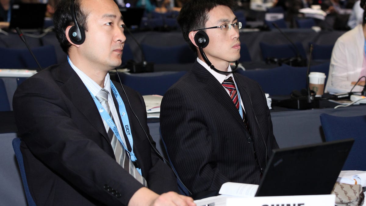 China's delegation, shown here at the Dubai summit that ends Friday, cited the "security of the state" when objecting to human rights language.