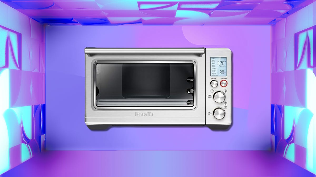 Breville BOV860BSS oven against CNET's spring sale commerce background.