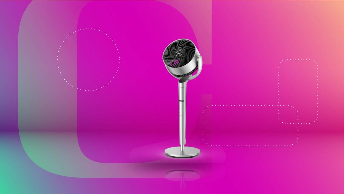 A gray room fan on a purple background.