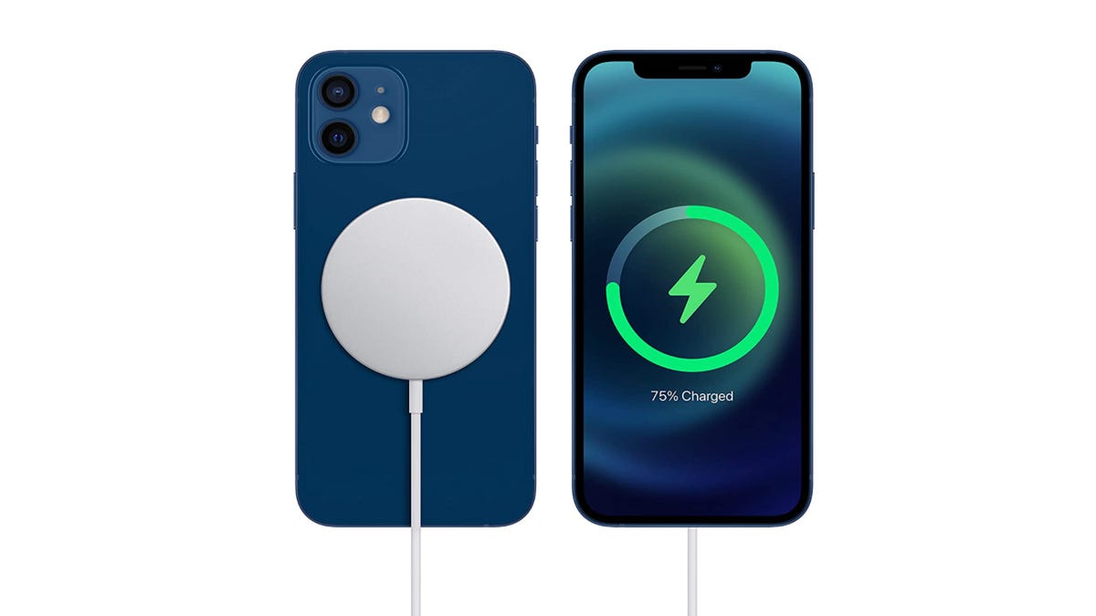 An iPhone recharging with a MagSafe charger on the back.