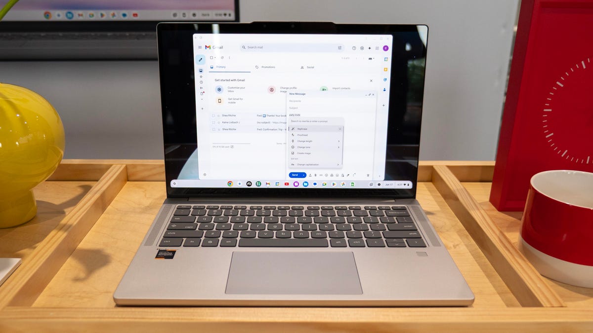 Lenovo Chromebook Plus 14 on a wood table.