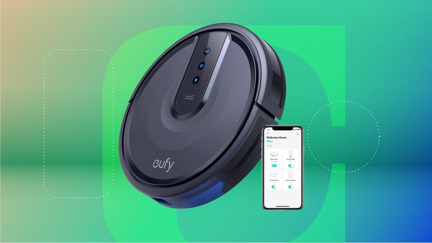 robot vacuum with a smartphone screen next to it