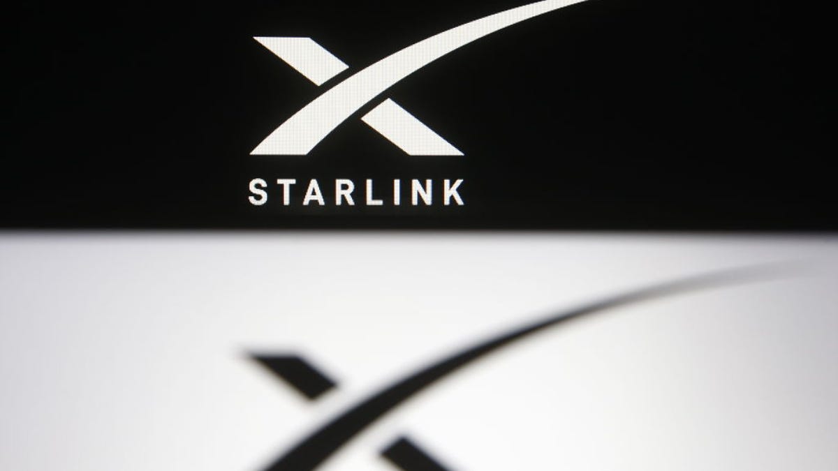 Photo illustration of a Starlink logo in black and while