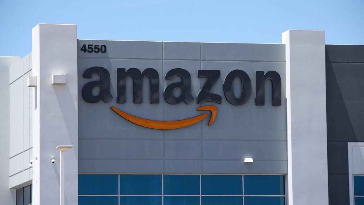 Amazon logo on fulfillment center building