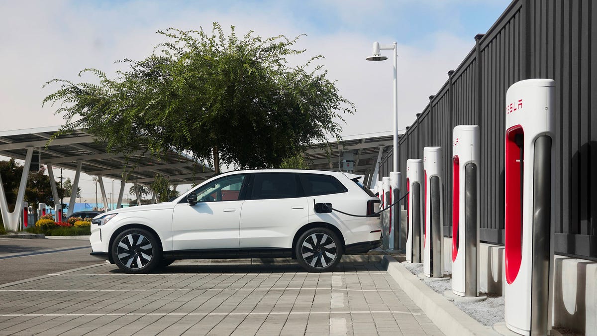 2025 Volvo EX90 charging at a Tesla Supercharger via the NACS adapter