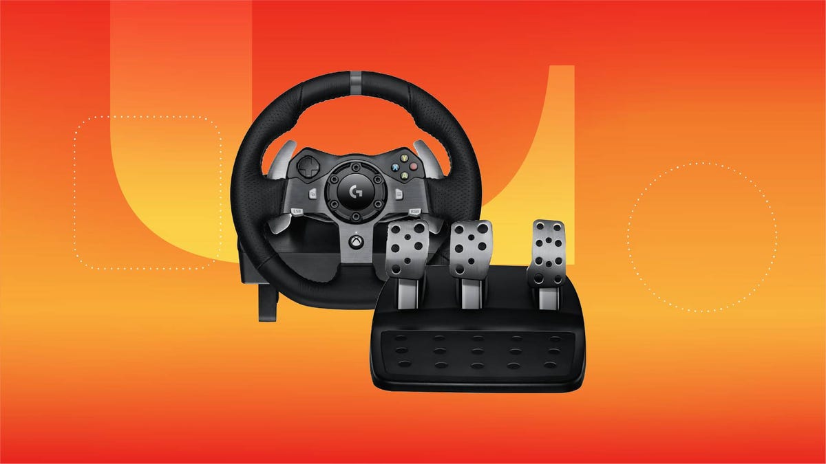 A steering wheel controller and pedals against an orange gradient CNET background.
