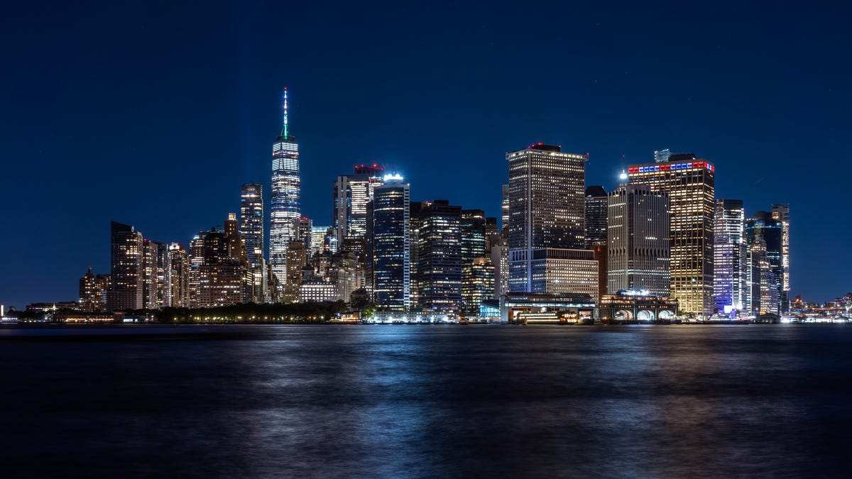 Twilight view from Governors Island looking north towards the lower Manhattan skyline, including One World Trade Center.