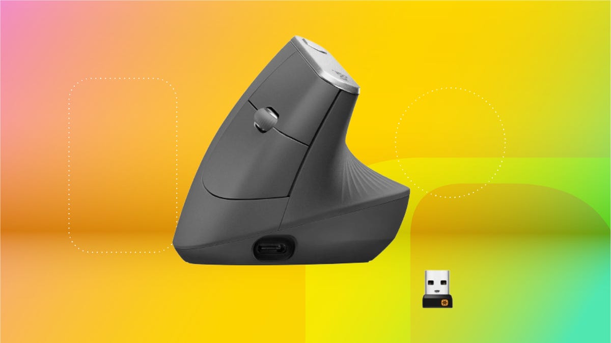 Black wireless vertical mouse against coral, yellow and mint green CNET background.