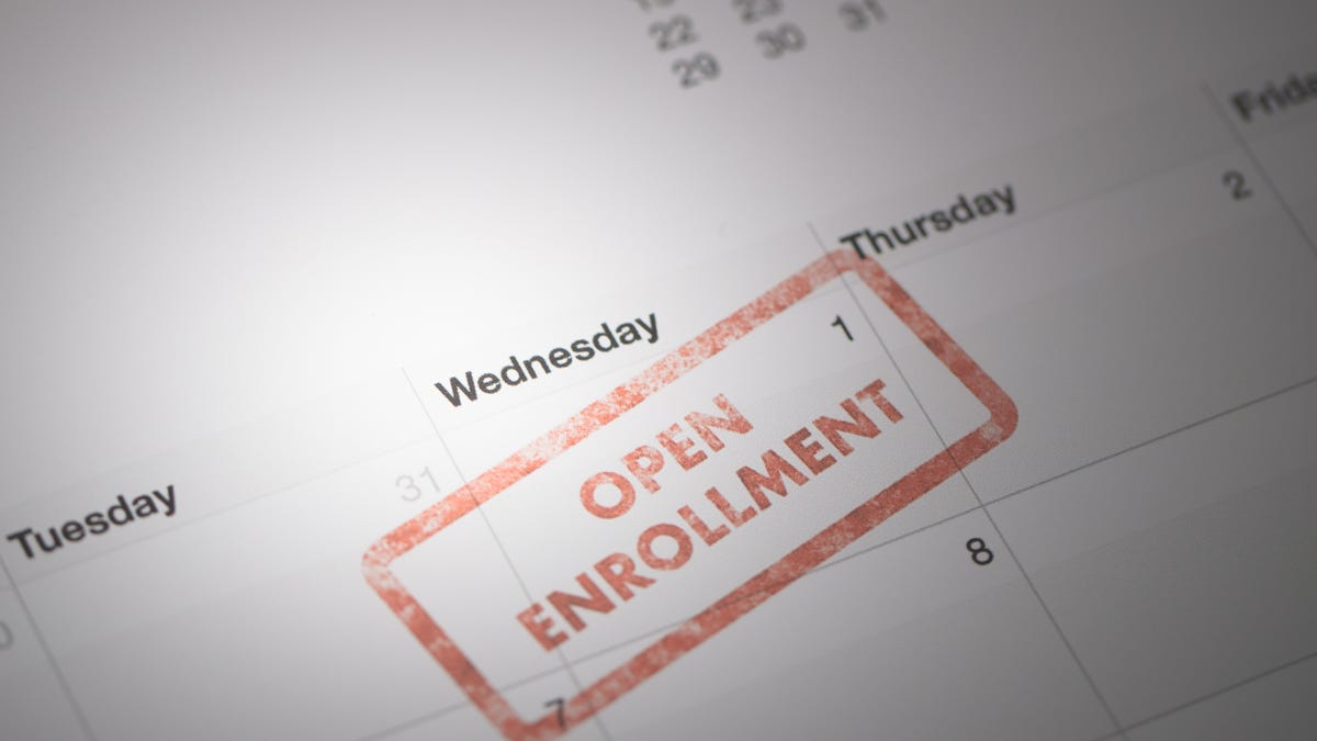 open enrollment stamp on a calendar