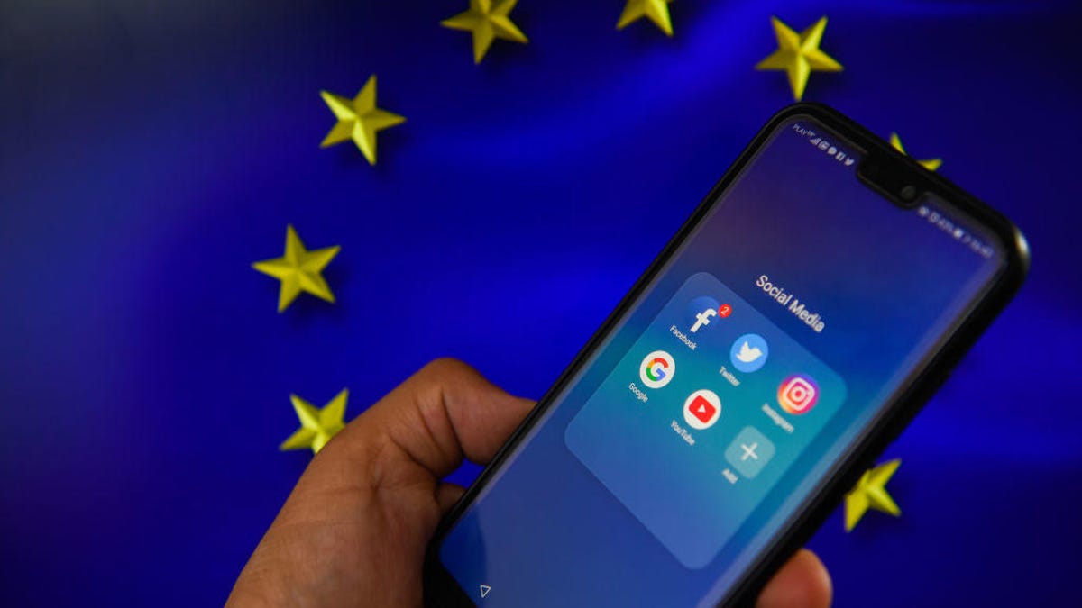 Facebook logo with European Union flag are seen in this