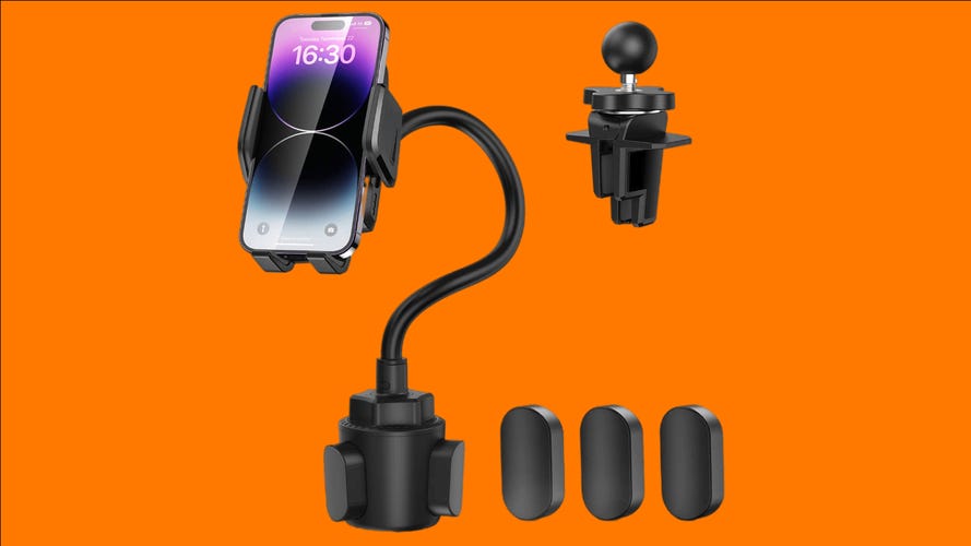 The Tecknet cup phone holder and its attachments in front of an orange background.
