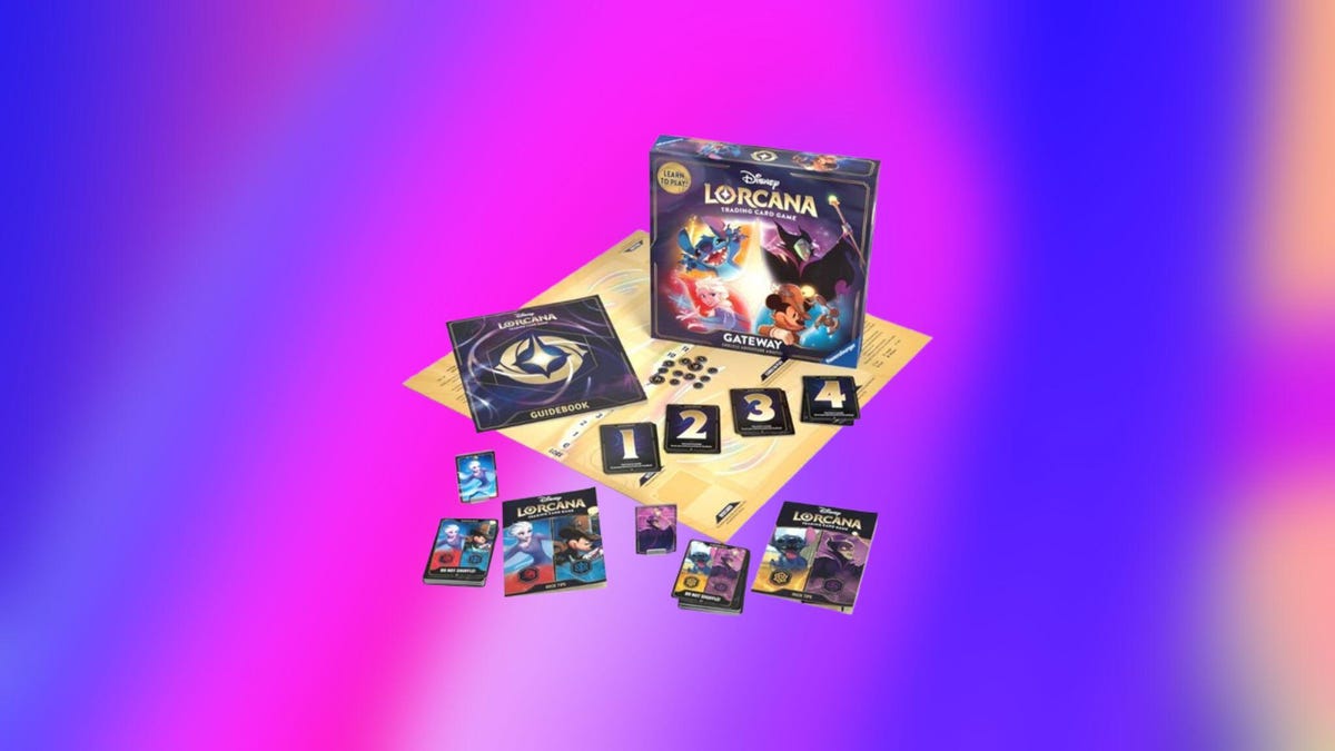 A Lorcana box and several cards laid out on a surface, with a pink and blue background