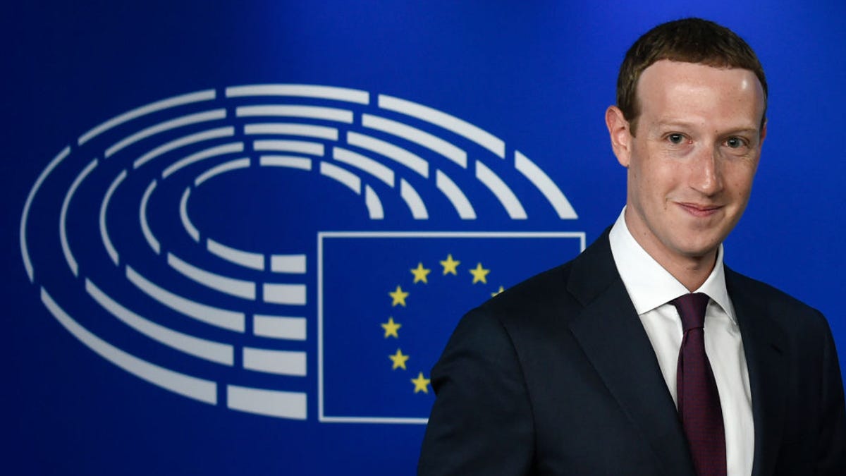 Mark Zuckerberg in front of EU flag