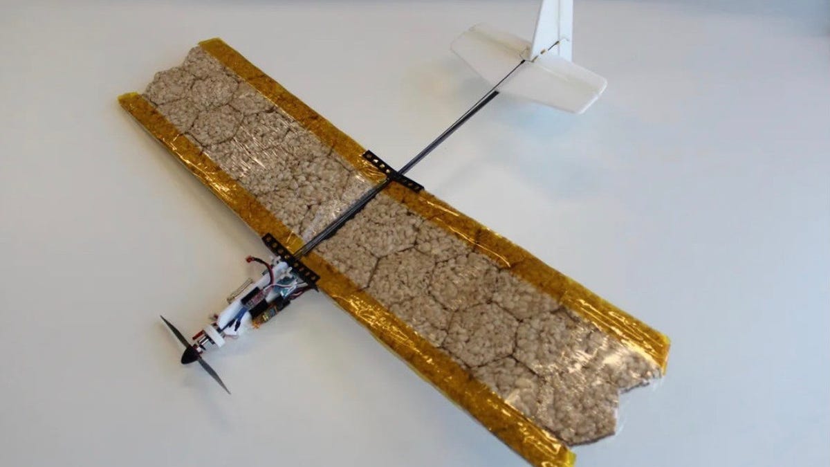 A propeller drone with wings made of rice cakes like a tiny edible airplane.