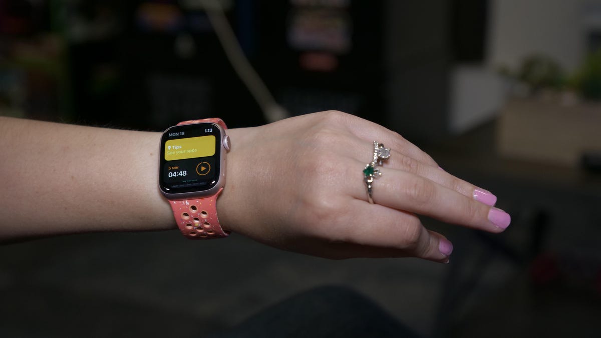 Apple Watch Series 9 on a wrist as someone double taps