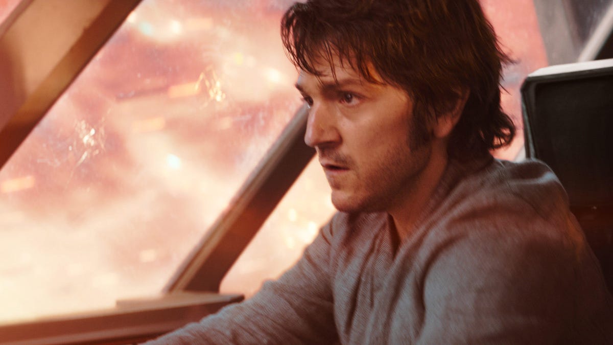 Cassian Andor flies a ship through flames in Andor