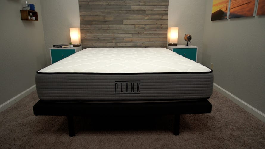 Plank mattress on a bed frame