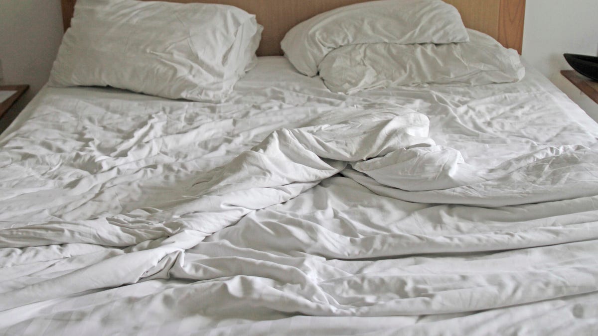 Messy bed unmade in the morning