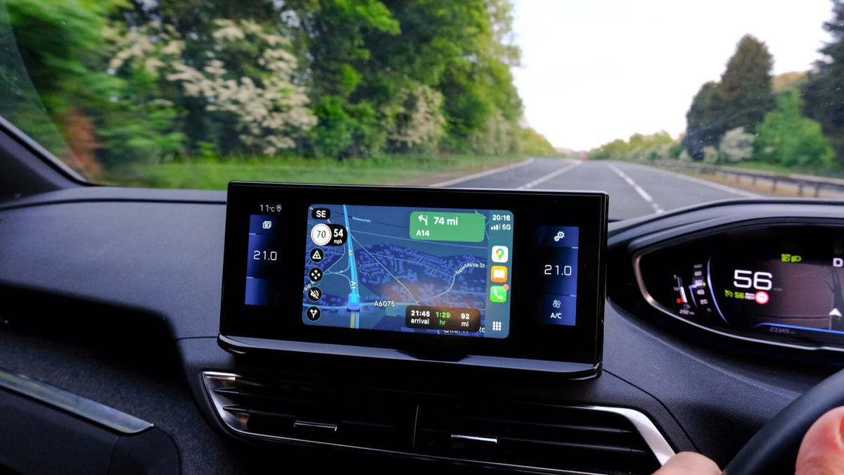 A Road trip or commute with the view out of the windscreen from the drivers perspective with Sat Nav google maps.