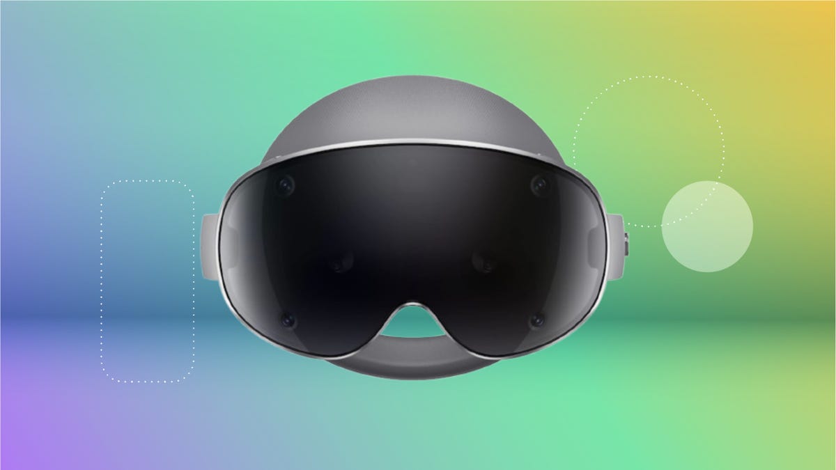 Samsung virtual reality headset in grey with black visor against blue, green and yellow background.