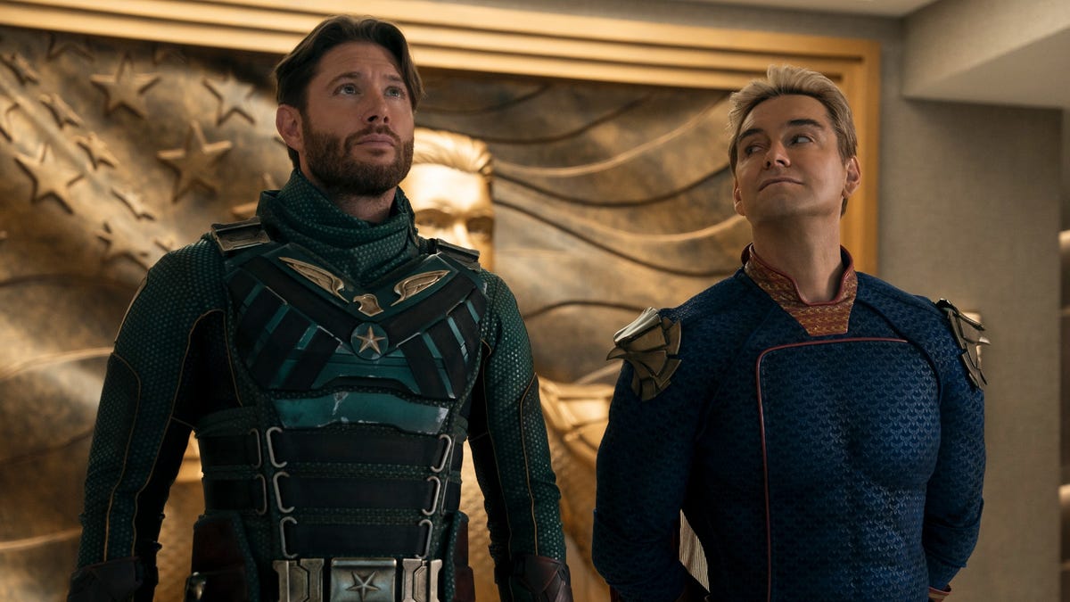 Production still from The Boys with Jensen Ackles and Antony Starr dressed in superhero outfits.
