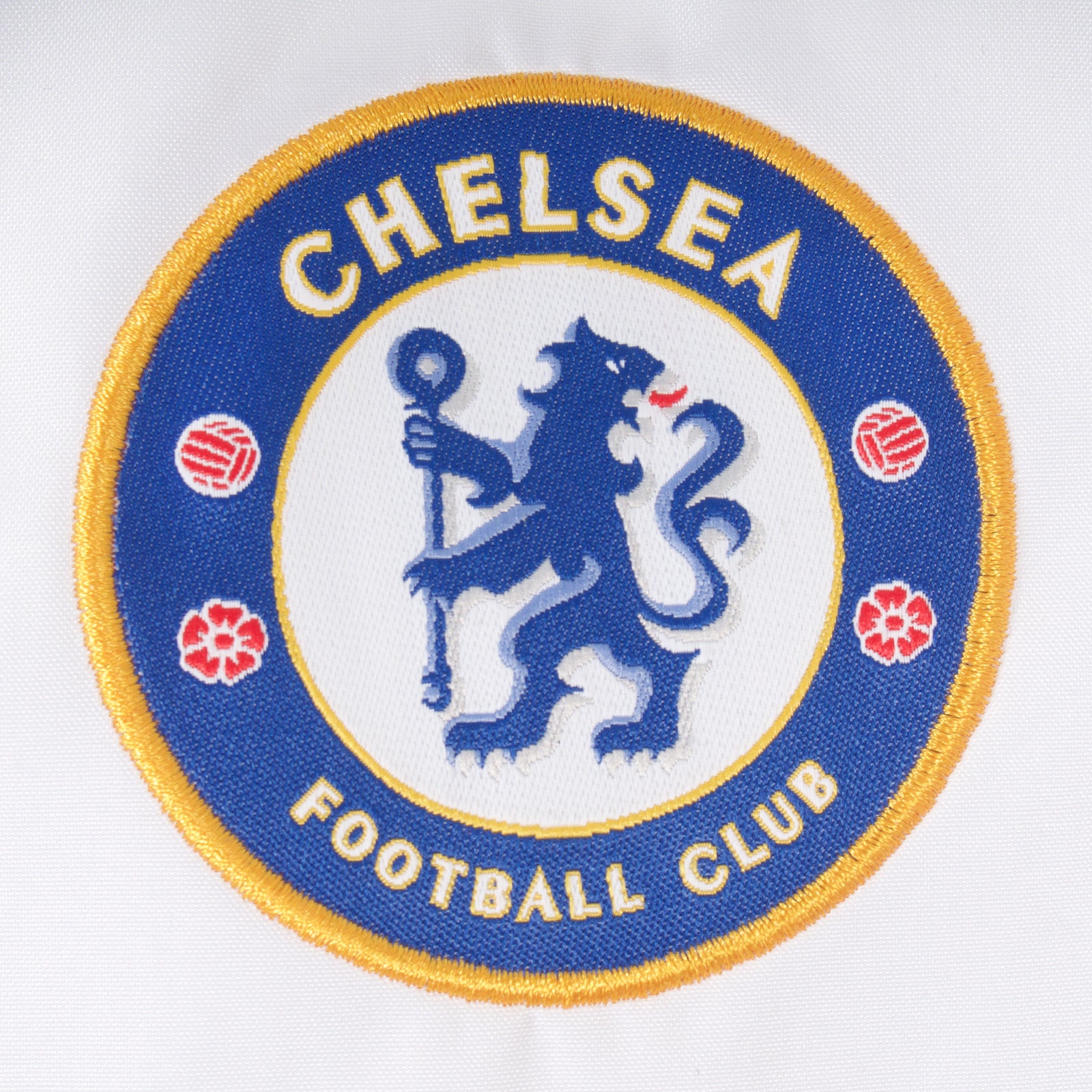 Chelsea kids shower jacket in royal blue & white with club crest to chest.