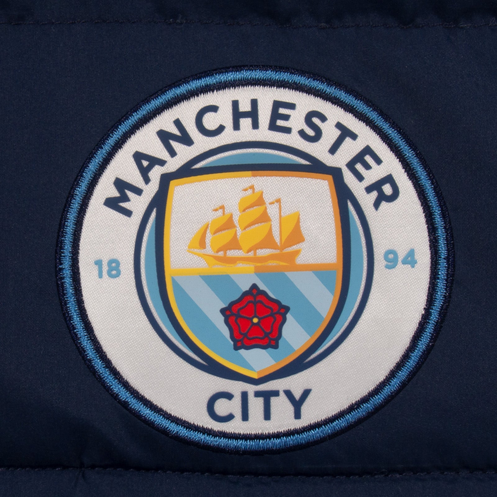 Man City adults gilet in black with full colour club crest to chest.